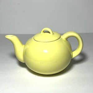 Ceramic Yellow Teapot. Has a few pinhole flaws throughout the teapot